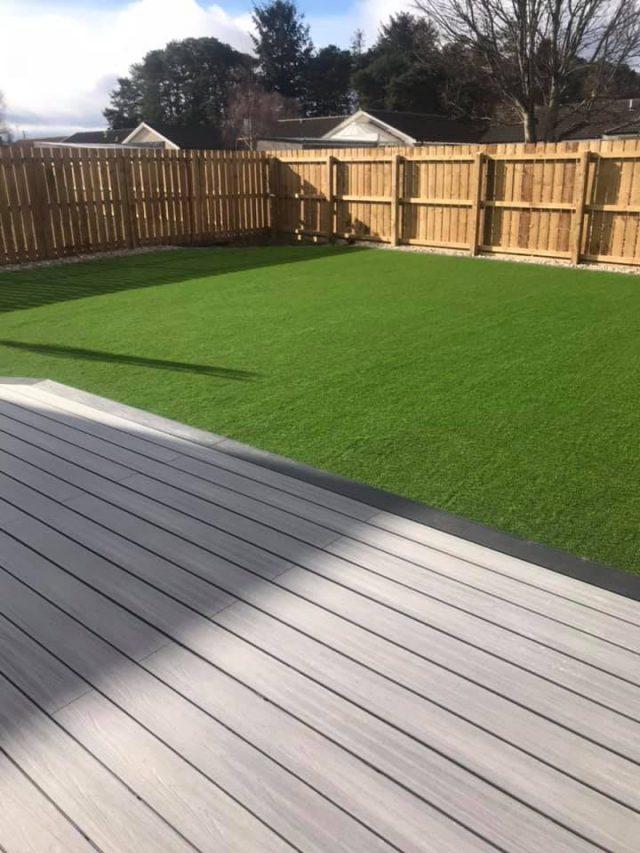 Artificial grass for gardens next to decking