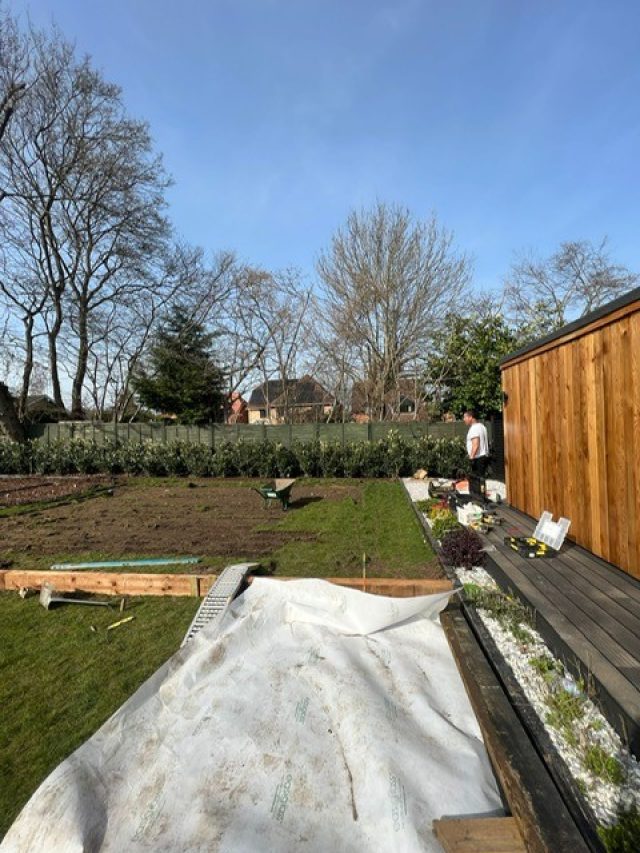 Fencing added to section for artificial grass installation